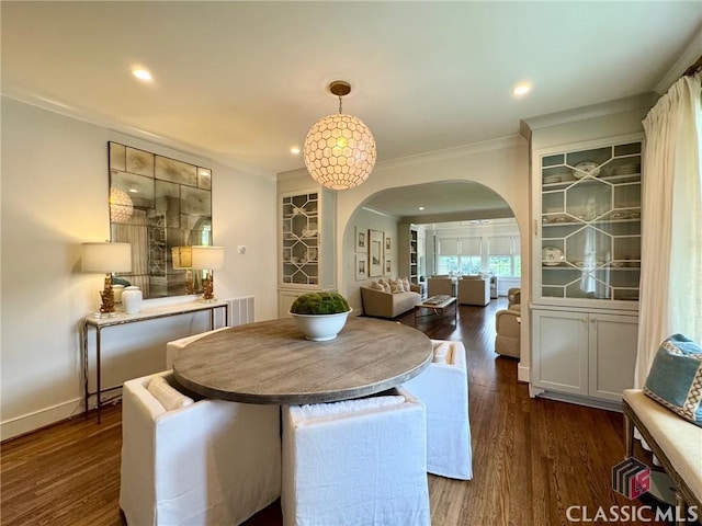 125 Woodland Way, Athens, GA 30606 - dining room with arched walkways, crown molding, dark wood-style floors, baseboards, and recessed lighting