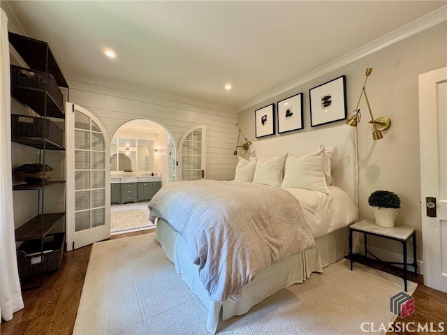125 Woodland Way, Athens, GA 30606 - bedroom with wood finished floors, recessed lighting, and ensuite bath