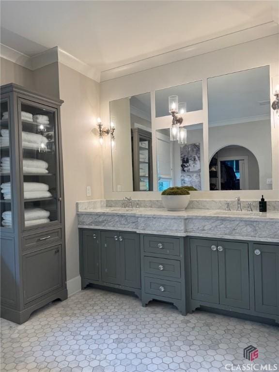 125 Woodland Way, Athens, GA 30606 - bathroom featuring crown molding, double vanity, and a chandelier