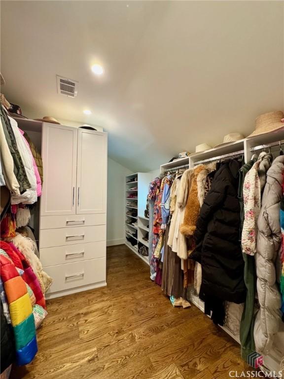 125 Woodland Way, Athens, GA 30606 - spacious closet with wood finished floors and lofted ceiling