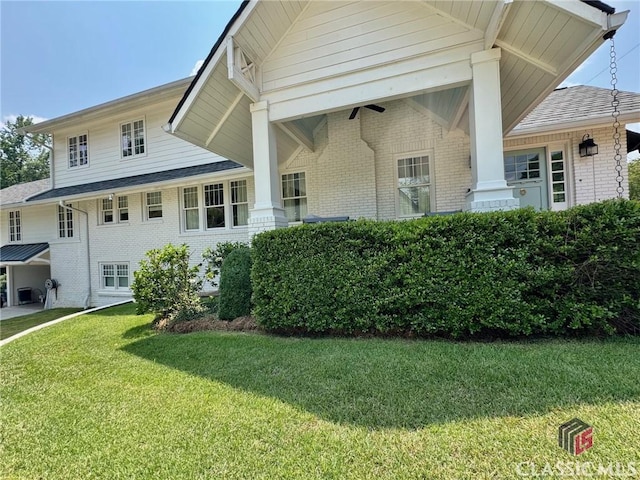 125 Woodland Way, Athens, GA 30606 - view of front of property featuring brick siding and a front lawn