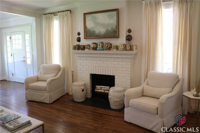 125 Woodland Way, Athens, GA 30606 - living room featuring dark wood-style flooring and a brick fireplace