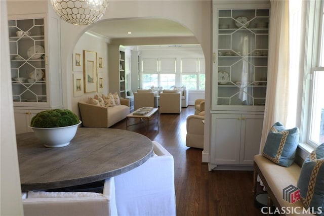 125 Woodland Way, Athens, GA 30606 - dining room with arched walkways and dark wood finished floors