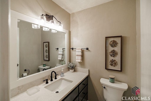 226 Baker St, Statham, GA 30666 - bathroom with toilet and vanity