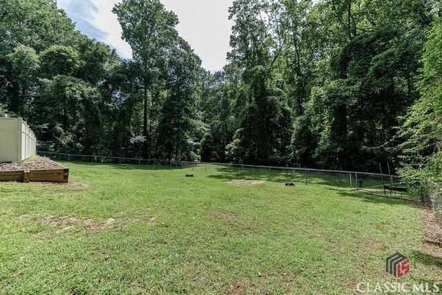 226 Baker St, Statham, GA 30666 - view of fenced backyard