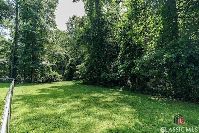 226 Baker St, Statham, GA 30666 - view of yard with a view of trees