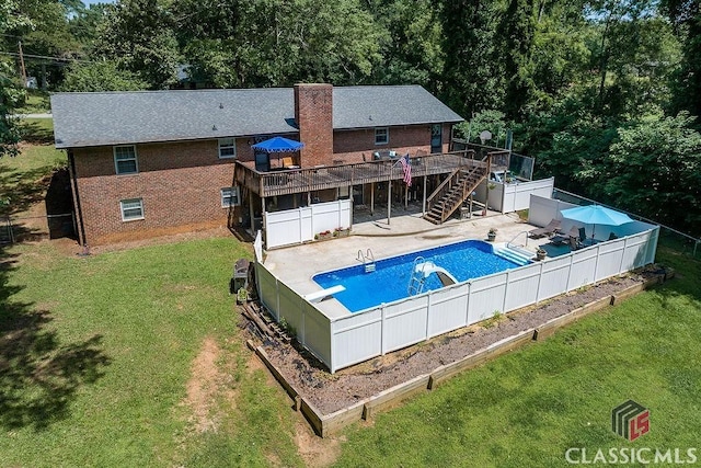 226 Baker St, Statham, GA 30666 - view of pool featuring stairs, a deck, a fenced backyard, a patio, and a water slide