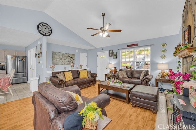 5480 Apache Trl, Gainesville, GA 30506 - living area with vaulted ceiling, ceiling fan, and light wood finished floors