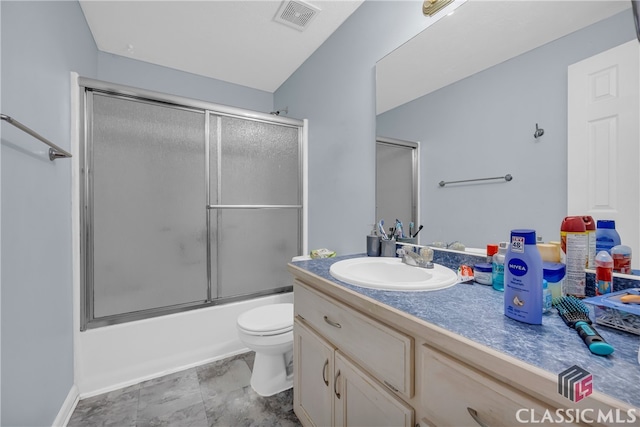 5480 Apache Trl, Gainesville, GA 30506 - bathroom featuring vanity and bath / shower combo with glass door