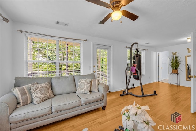 5480 Apache Trl, Gainesville, GA 30506 - living room with wood finished floors and ceiling fan
