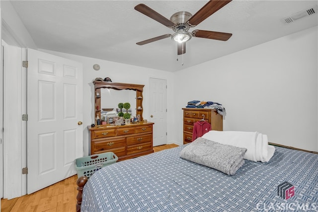 5480 Apache Trl, Gainesville, GA 30506 - bedroom with light wood-style floors and ceiling fan