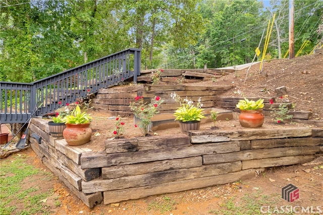 5480 Apache Trl, Gainesville, GA 30506 - wooden terrace with stairs and view of scattered trees