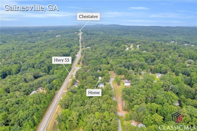 5480 Apache Trl, Gainesville, GA 30506 - aerial overview of property's location with a forest and property parcel outlined