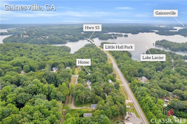 5480 Apache Trl, Gainesville, GA 30506 - drone / aerial view of a nearby body of water and a heavily wooded area