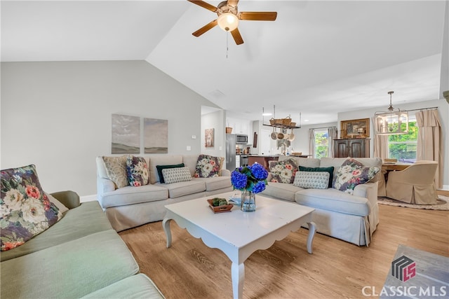 120 Peach Ln, Royston, GA 30662 - living area with ceiling fan, light wood finished floors, and lofted ceiling
