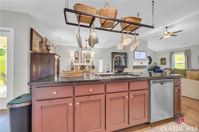 120 Peach Ln, Royston, GA 30662 - kitchen with stainless steel dishwasher, open floor plan, lofted ceiling, light wood-style floors, and ceiling fan