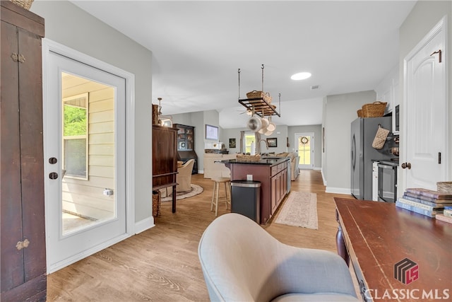 120 Peach Ln, Royston, GA 30662 - living area with light wood-style flooring and baseboards