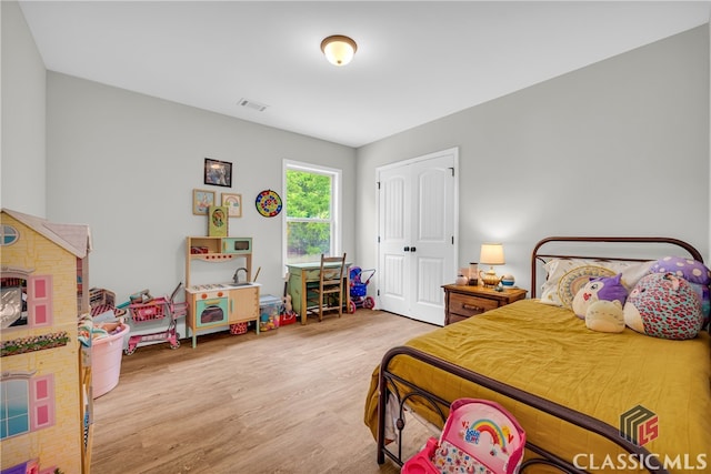 120 Peach Ln, Royston, GA 30662 - bedroom with wood finished floors and a closet