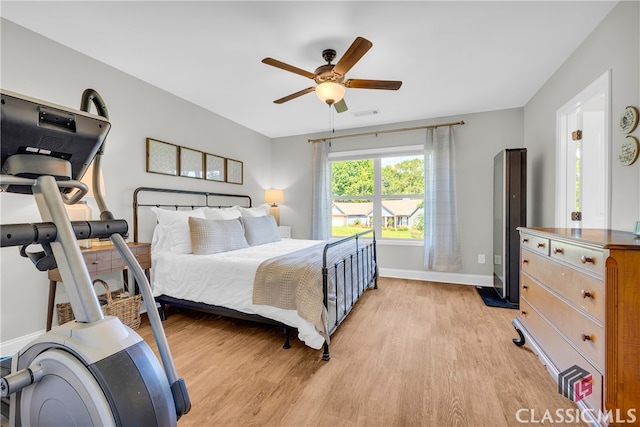 120 Peach Ln, Royston, GA 30662 - bedroom with light wood-style flooring and ceiling fan