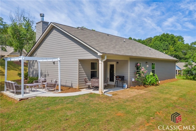120 Peach Ln, Royston, GA 30662 - rear view of house featuring a pergola, a patio, a lawn, and a chimney