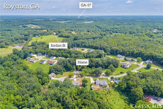 120 Peach Ln, Royston, GA 30662 - aerial view of residential area with a heavily wooded area