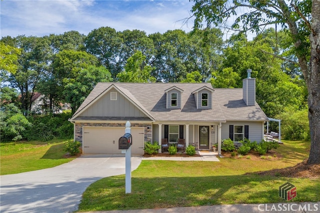 120 Peach Ln, Royston, GA 30662 - view of front of house featuring a porch, a front lawn, a garage, concrete driveway, and a chimney