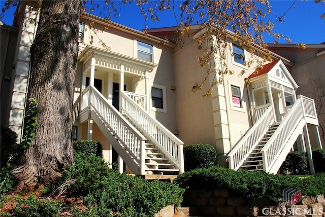 290 Appleby Dr Unit 268, Athens, GA 30605 - view of front of home featuring stairs, stucco siding, and covered porch