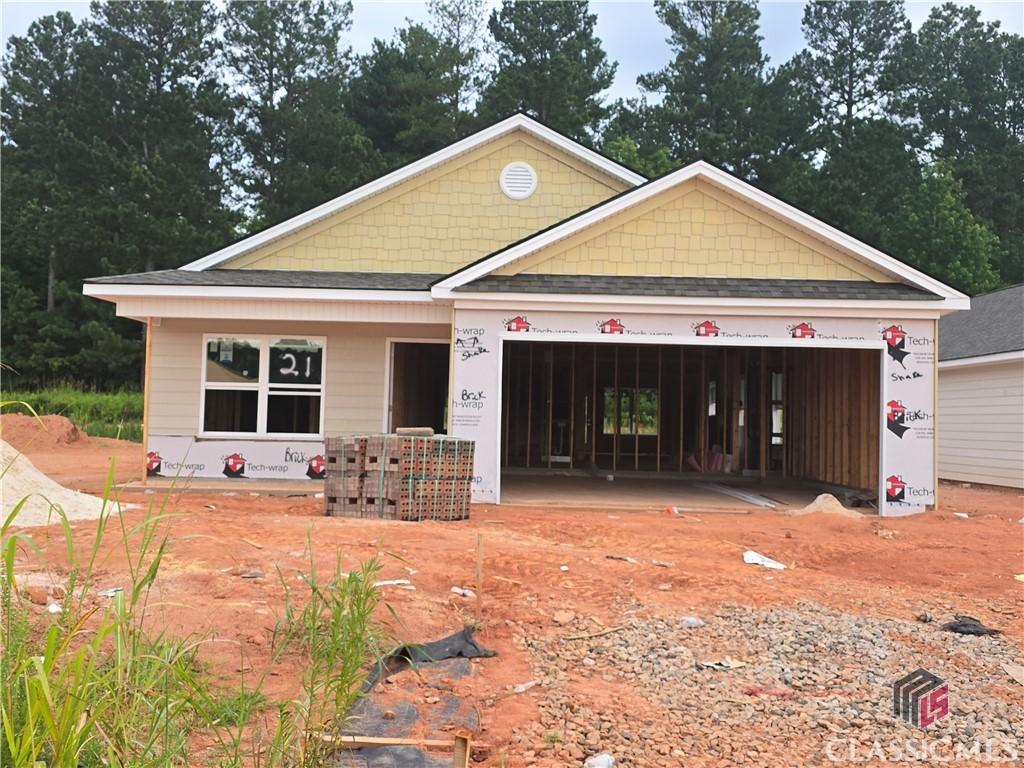 101 Charlie Way Unit 21, Winder, GA 30680 - property under construction featuring an attached garage and driveway