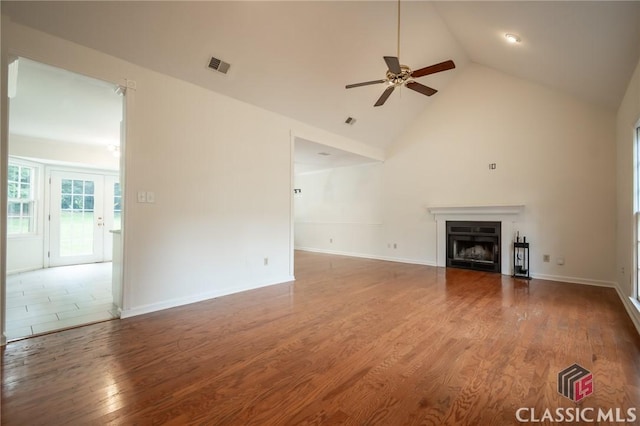 170 Chadds Walk, Athens, GA 30606 - unfurnished living room featuring ceiling fan, wood finished floors, a fireplace, and high vaulted ceiling