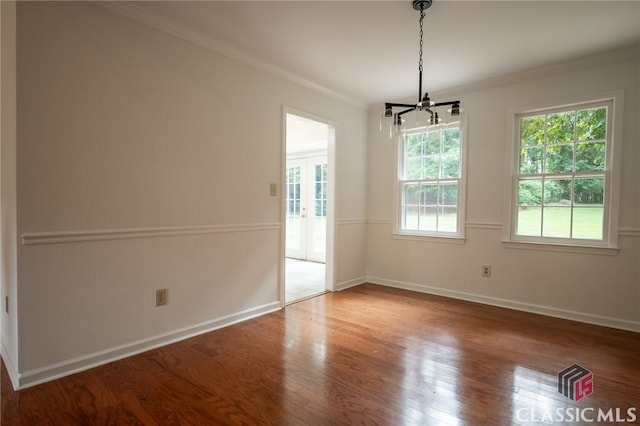 170 Chadds Walk, Athens, GA 30606 - spare room featuring a chandelier, wood finished floors, and crown molding