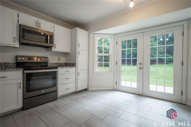 170 Chadds Walk, Athens, GA 30606 - kitchen with stainless steel appliances, ornamental molding, healthy amount of natural light, and french doors