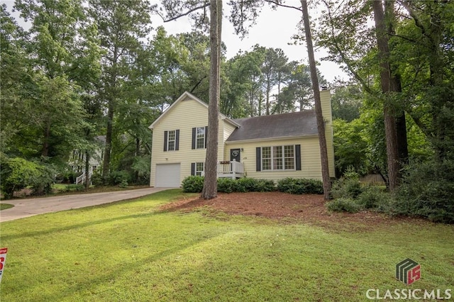 170 Chadds Walk, Athens, GA 30606 - split level home with an attached garage, a chimney, concrete driveway, and a front yard
