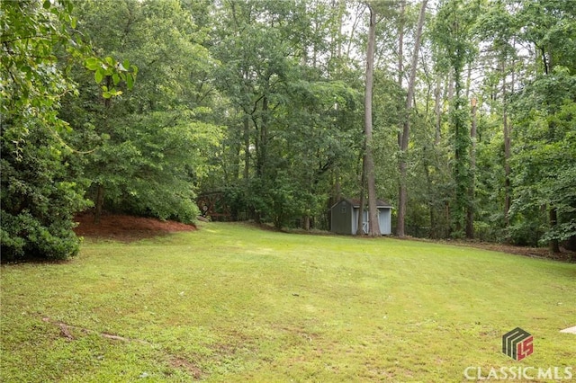 170 Chadds Walk, Athens, GA 30606 - view of grassy yard with a shed