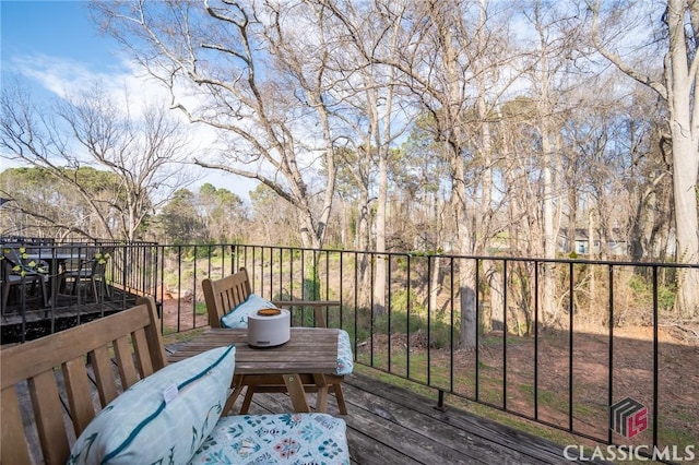 2165 S Milledge Ave Unit F4, Athens, GA 30605 - wooden deck with outdoor dining space