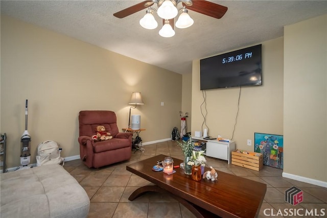 2165 S Milledge Ave Unit F4, Athens, GA 30605 - living room featuring tile patterned flooring, a ceiling fan, and a textured ceiling