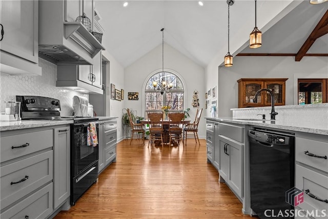 1233 Staplers Bridge Rd, Nicholson, GA 30565 - kitchen featuring black appliances, gray cabinetry, backsplash, and lofted ceiling