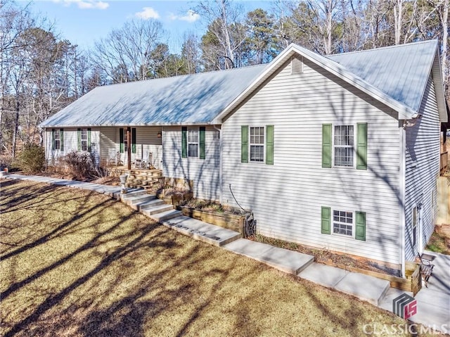 1233 Staplers Bridge Rd, Nicholson, GA 30565 - single story home featuring a front yard and a metal roof