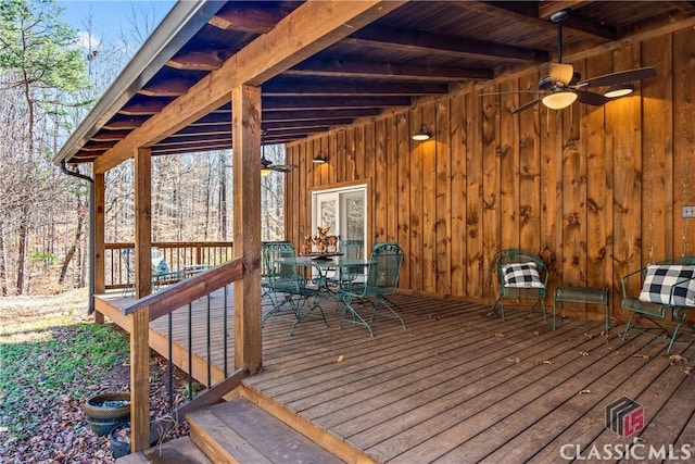 1233 Staplers Bridge Rd, Nicholson, GA 30565 - wooden deck featuring ceiling fan and outdoor dining space