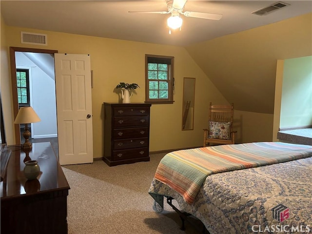 2181 Whippoorwill Rd, Bishop, GA 30621 - carpeted bedroom with multiple windows, lofted ceiling, and ceiling fan