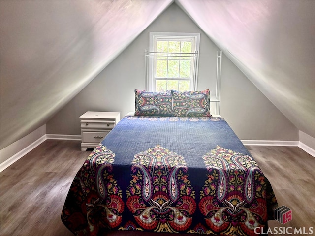 2181 Whippoorwill Rd, Bishop, GA 30621 - bedroom with wood finished floors and vaulted ceiling