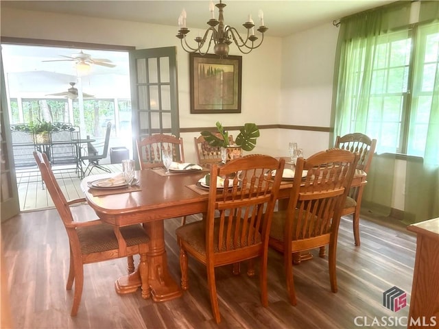 2181 Whippoorwill Rd, Bishop, GA 30621 - dining room featuring wood finished floors, a chandelier, and a ceiling fan