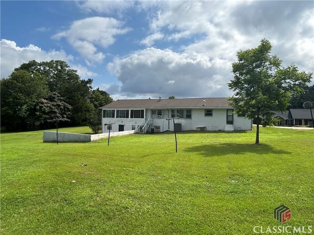 220 Swanson Dr W Unit 1, Athens, GA 30606 - rear view of house featuring a lawn and a sunroom