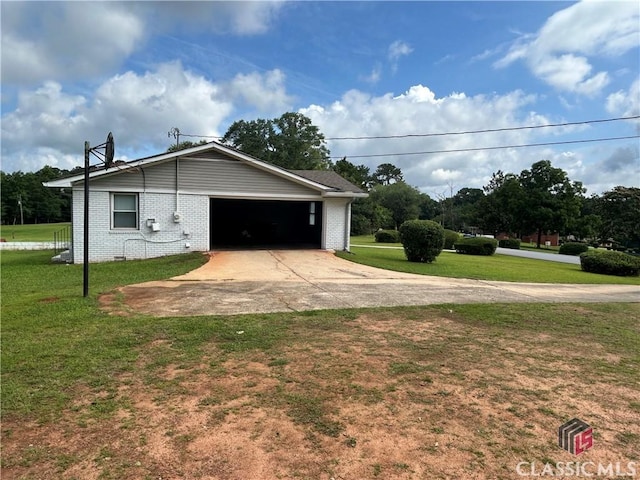 220 Swanson Dr W Unit 1, Athens, GA 30606 - view of side of property featuring driveway, an attached garage, a lawn, and brick siding