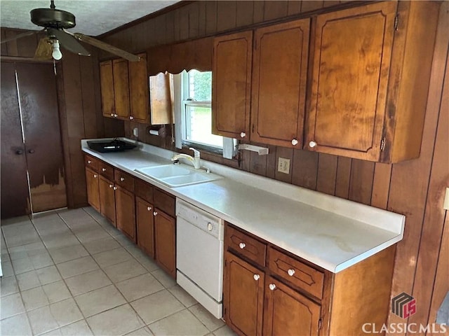 220 Swanson Dr W Unit 1, Athens, GA 30606 - kitchen with dishwasher, brown cabinets, light countertops, a ceiling fan, and light tile patterned floors