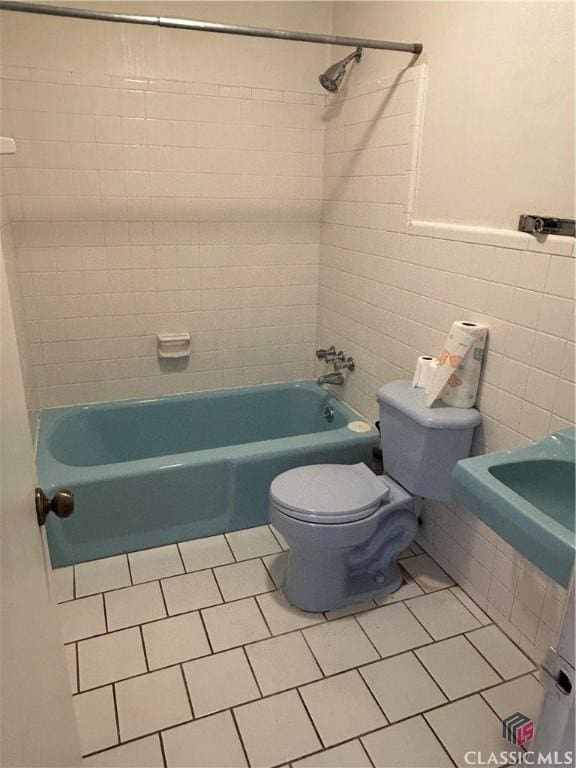 220 Swanson Dr W Unit 1, Athens, GA 30606 - bathroom featuring tile patterned flooring, shower / bathtub combination, and tile walls