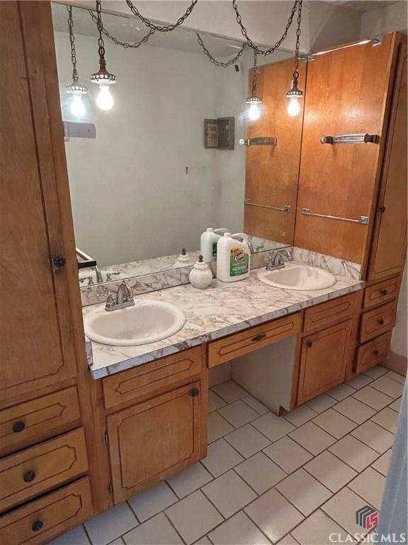 220 Swanson Dr W Unit 1, Athens, GA 30606 - bathroom with double vanity and tile patterned floors