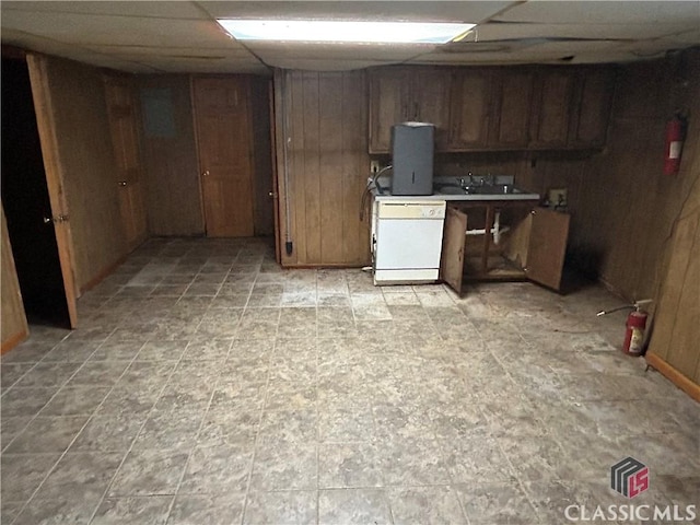 220 Swanson Dr W Unit 1, Athens, GA 30606 - kitchen with white dishwasher, wood walls, a paneled ceiling, and light countertops