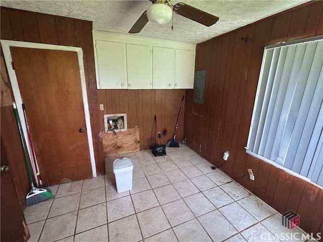 220 Swanson Dr W Unit 1, Athens, GA 30606 - laundry area with cabinet space, wooden walls, electric panel, hookup for a washing machine, and ceiling fan