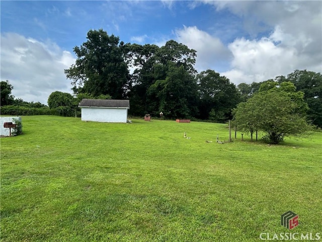 220 Swanson Dr W Unit 1, Athens, GA 30606 - view of grassy yard featuring a shed
