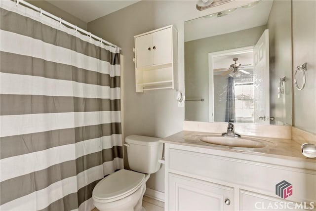 105 Whitehead Rd Unit 17, Athens, GA 30606 - bathroom with vanity, a ceiling fan, and curtained shower